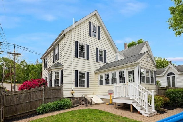 518 Washington St, Winchester, MA 01890 - back of property with a shingled roof