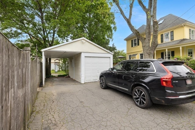 518 Washington St, Winchester, MA 01890 - garage with asphalt driveway and a garage