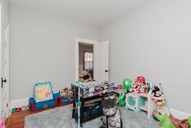 playroom featuring hardwood / wood-style flooring