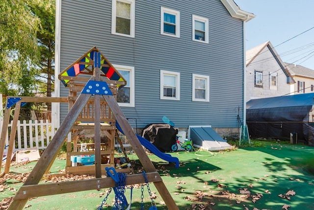 view of playground with a yard