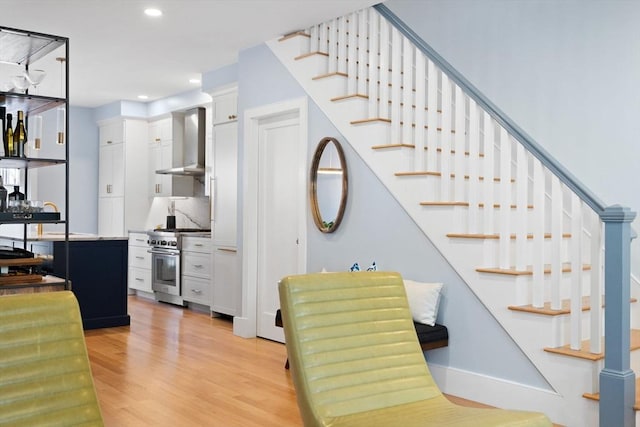 424-430 W 4th St Unit 428, Boston, MA 02127 - stairway with wood finished floors and recessed lighting