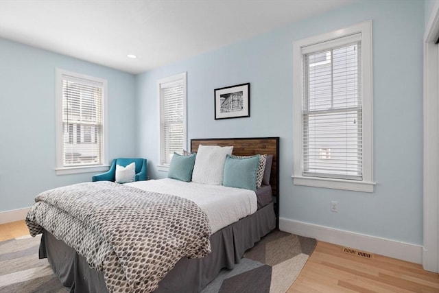 424-430 W 4th St Unit 428, Boston, MA 02127 - bedroom featuring wood finished floors, multiple windows, and recessed lighting