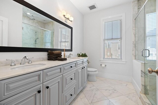 424-430 W 4th St Unit 428, Boston, MA 02127 - full bathroom with a marble finish shower, double vanity, and marble finish flooring