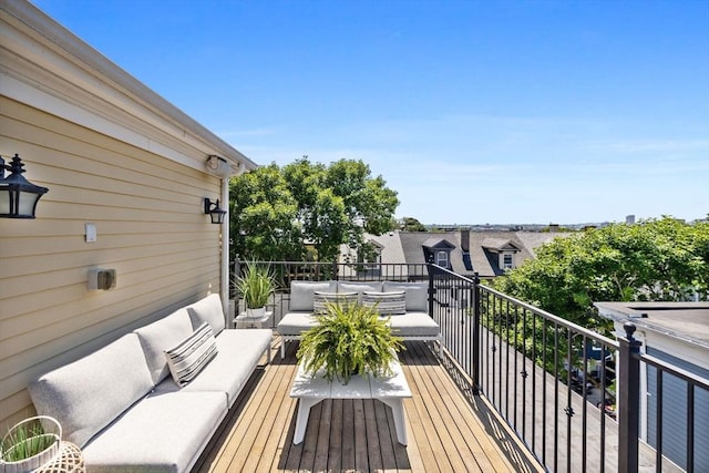 424-430 W 4th St Unit 428, Boston, MA 02127 - wooden deck with outdoor lounge area