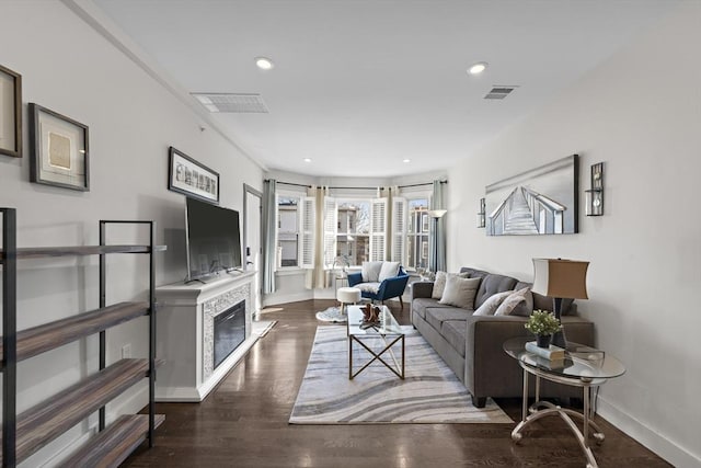 living room featuring dark hardwood / wood-style floors