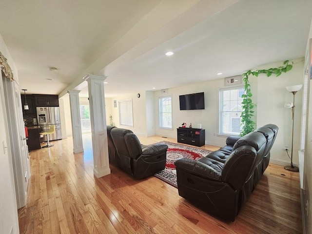 2 Carousel Ter, Dartmouth, MA 02747 - living room featuring decorative columns, light wood-type flooring, baseboards, and recessed lighting