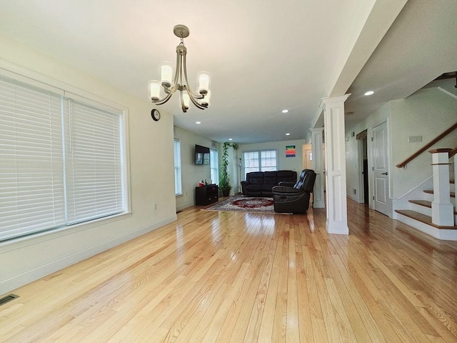 2 Carousel Ter, Dartmouth, MA 02747 - living area with light wood-style floors, stairway, a chandelier, baseboards, and recessed lighting