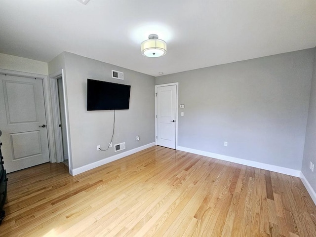 2 Carousel Ter, Dartmouth, MA 02747 - unfurnished living room featuring baseboards and light wood finished floors