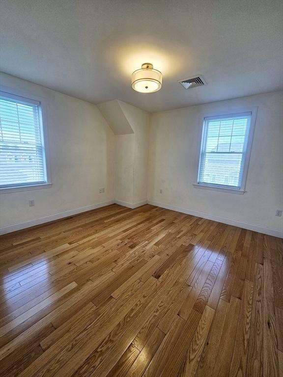 2 Carousel Ter, Dartmouth, MA 02747 - additional living space featuring wood-type flooring, plenty of natural light, and baseboards