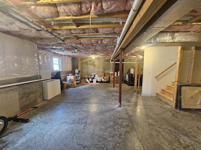 2 Carousel Ter, Dartmouth, MA 02747 - below grade area featuring refrigerator and stairs