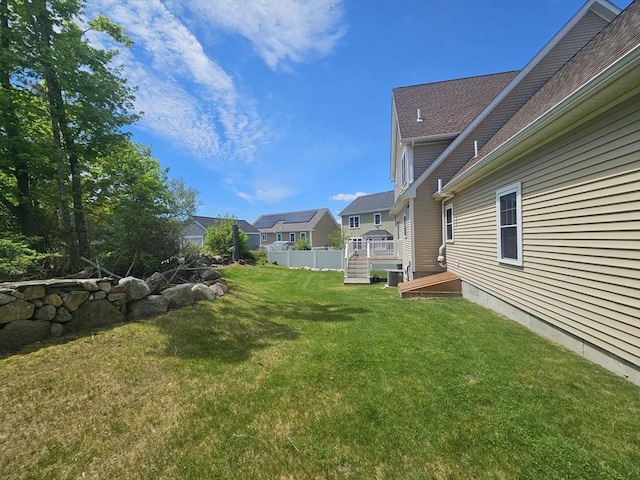 2 Carousel Ter, Dartmouth, MA 02747 - view of green lawn with central AC unit and a residential view