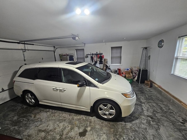 2 Carousel Ter, Dartmouth, MA 02747 - garage featuring a garage door opener