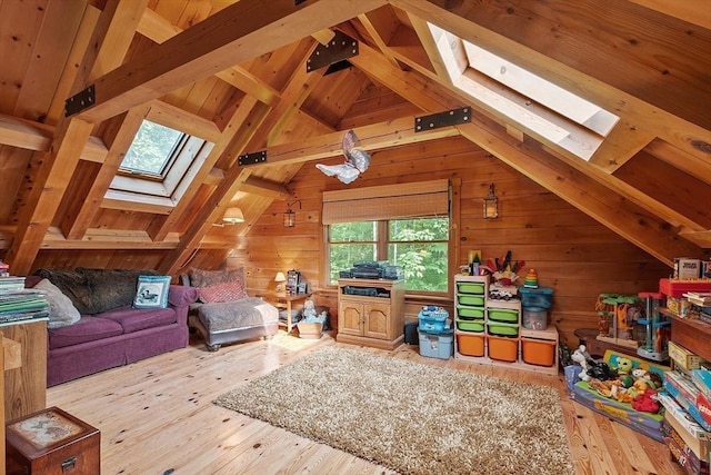 8 Turk Hollow Rd, Oxford, MA 01540 - interior space featuring lofted ceiling with skylight, wooden walls, and wood-type flooring