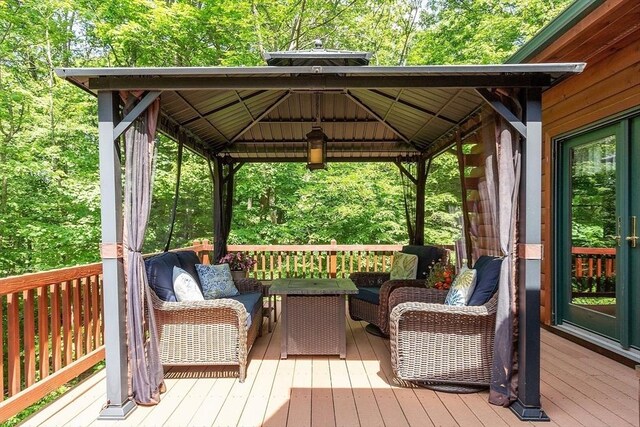 8 Turk Hollow Rd, Oxford, MA 01540 - wooden deck with an outdoor living space and a gazebo