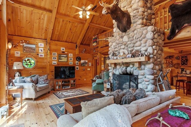 8 Turk Hollow Rd, Oxford, MA 01540 - living area with hardwood / wood-style floors, beam ceiling, a ceiling fan, and wood walls