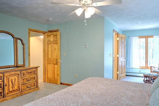 bedroom featuring baseboards, a ceiling fan, a baseboard heating unit, and light carpet