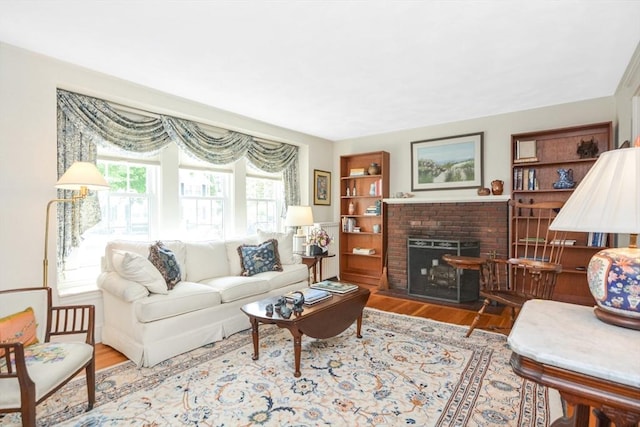 21 Stevens Rd, Needham, MA 02492 - living area with wood finished floors and a fireplace