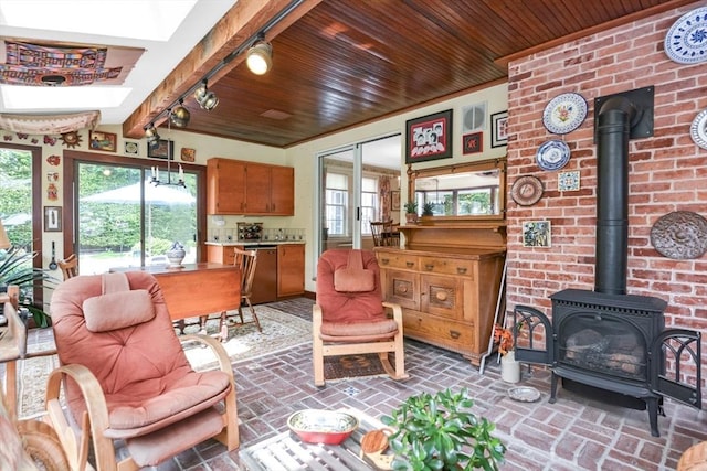 21 Stevens Rd, Needham, MA 02492 - living room with a wood stove, wood ceiling, and brick patterned flooring