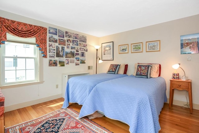 21 Stevens Rd, Needham, MA 02492 - bedroom featuring wood finished floors and baseboards