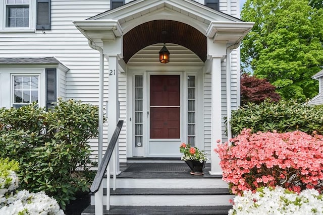 21 Stevens Rd, Needham, MA 02492 - property entrance with a chimney