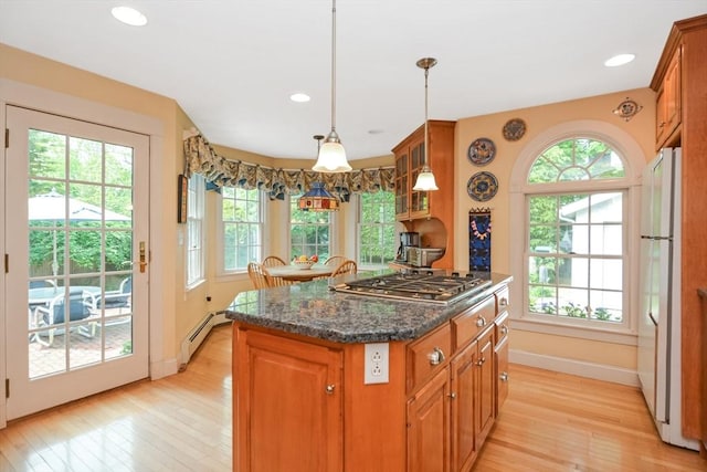21 Stevens Rd, Needham, MA 02492 - kitchen featuring freestanding refrigerator, stainless steel gas cooktop, light wood finished floors, baseboards, and recessed lighting