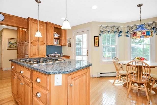 21 Stevens Rd, Needham, MA 02492 - kitchen featuring light wood-type flooring, a baseboard radiator, a center island, dark stone counters, and recessed lighting