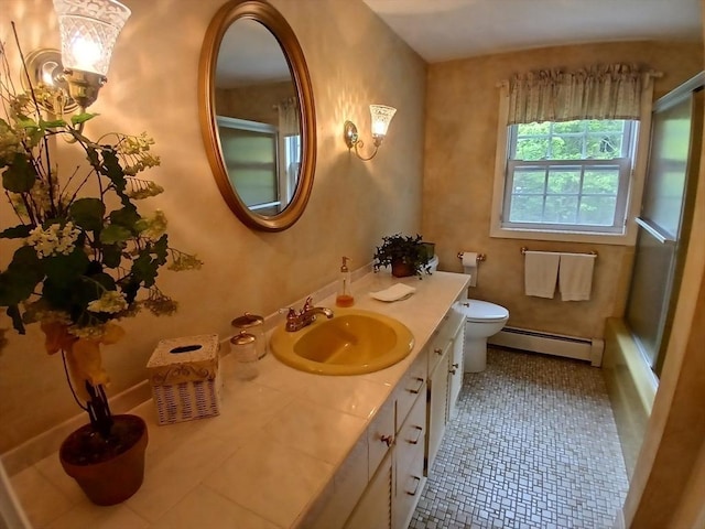 100 D Dr, Westport, MA 02790 - bathroom with baseboard heating, vanity, and tile patterned flooring