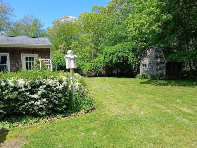 100 D Dr, Westport, MA 02790 - view of green lawn featuring a storage shed