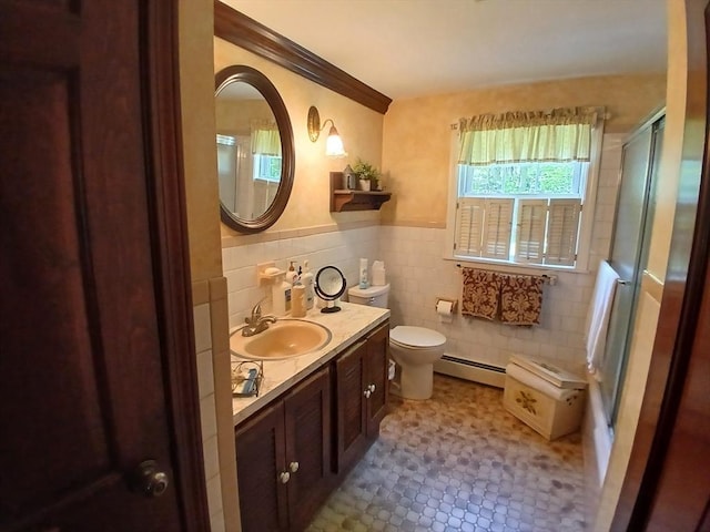 100 D Dr, Westport, MA 02790 - full bath with a baseboard radiator, vanity, tile walls, an enclosed shower, and wainscoting