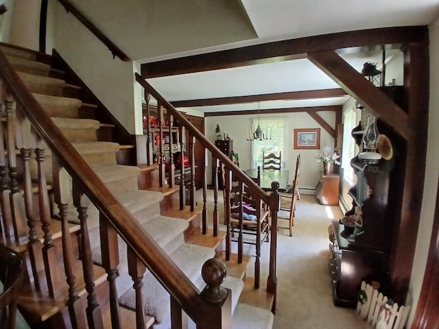 100 D Dr, Westport, MA 02790 - stairway with a chandelier and carpet floors