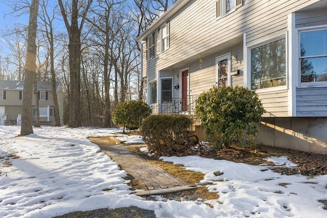 view of snow covered property