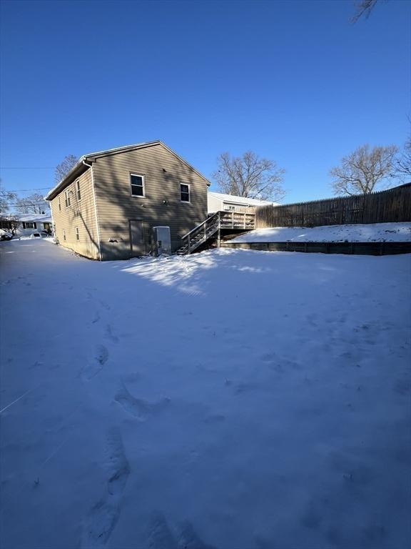 view of snow covered property