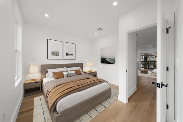 bedroom featuring light wood-type flooring