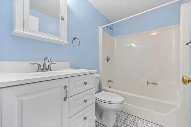 bathroom with toilet, shower / tub combination, vanity, a textured ceiling, and tile patterned flooring
