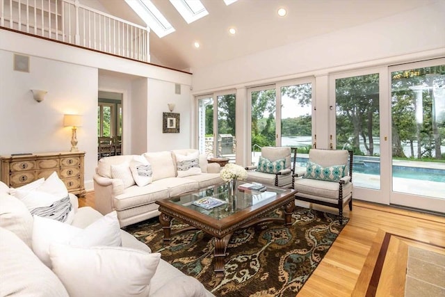 385 Barnes Rd, Oak Bluffs, MA 02557 - living area with a skylight, high vaulted ceiling, recessed lighting, and wood finished floors