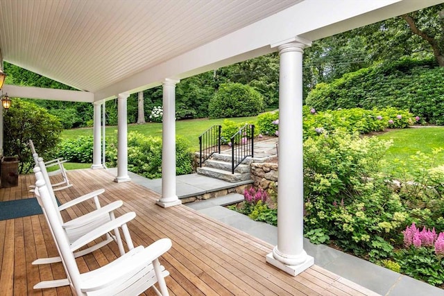 385 Barnes Rd, Oak Bluffs, MA 02557 - deck featuring a porch and a lawn