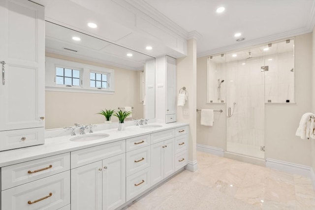 bathroom featuring double vanity, baseboards, crown molding, a shower stall, and a sink