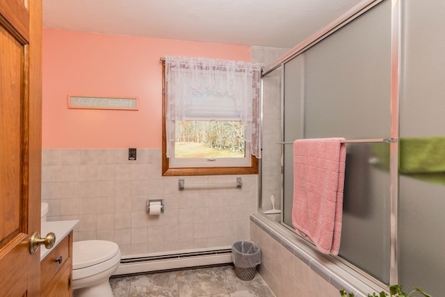 bathroom featuring vanity, an enclosed shower, toilet, and a baseboard radiator