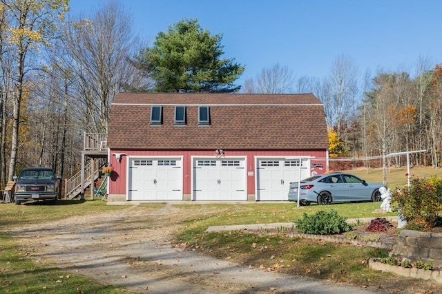 garage with a yard