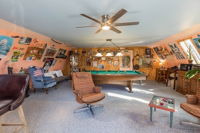 game room featuring ceiling fan, pool table, carpet floors, and wooden walls