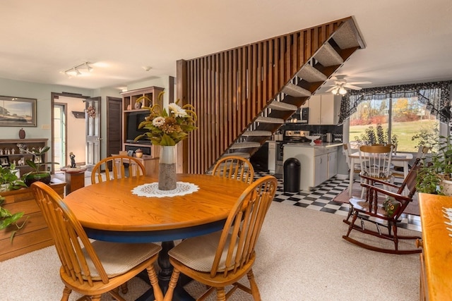 dining area with ceiling fan