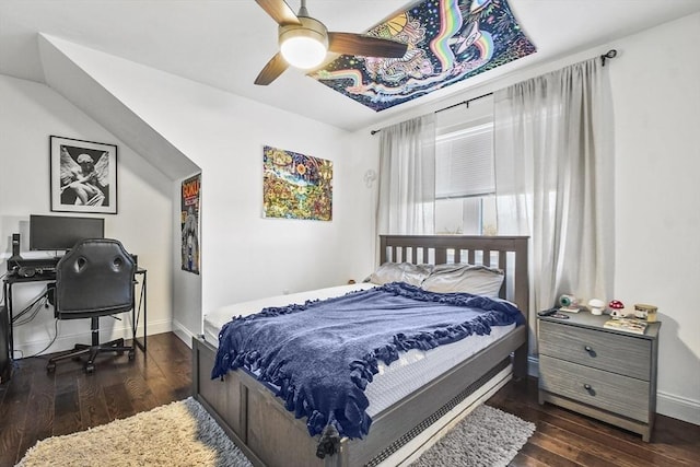 bedroom featuring ceiling fan and dark hardwood / wood-style floors