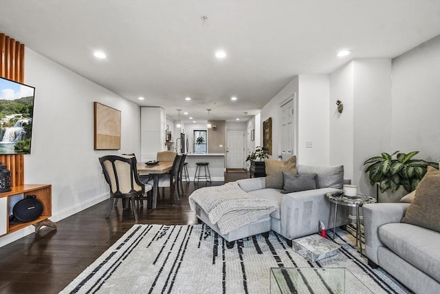 living room with dark wood-type flooring