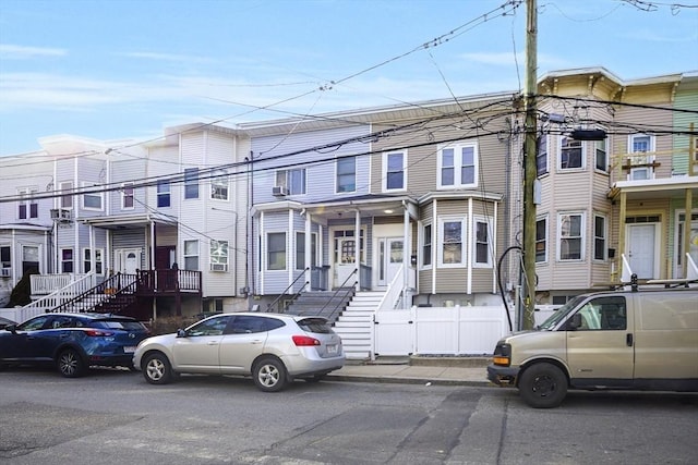 multi unit property featuring fence