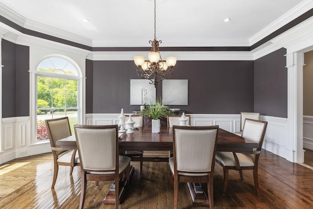 3 Newton Ln, Medway, MA 02053 - dining room with a chandelier, a decorative wall, crown molding, wainscoting, and wood finished floors
