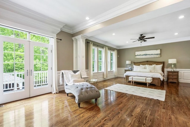3 Newton Ln, Medway, MA 02053 - bedroom featuring access to exterior, decorative columns, crown molding, a decorative wall, and wood finished floors