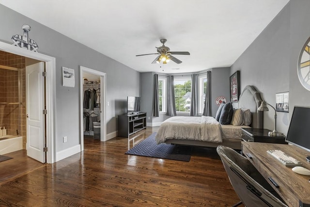 3 Newton Ln, Medway, MA 02053 - bedroom with wood finished floors, a walk in closet, connected bathroom, baseboards, and ceiling fan