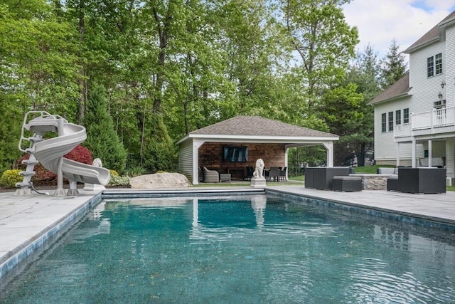 3 Newton Ln, Medway, MA 02053 - outdoor pool with an outdoor hangout area, a water slide, and a patio