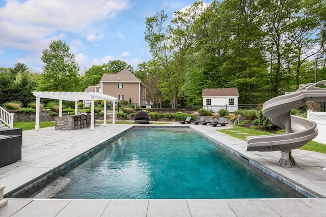 3 Newton Ln, Medway, MA 02053 - swimming pool featuring a pergola, a water slide, a patio, an outdoor structure, and view of scattered trees