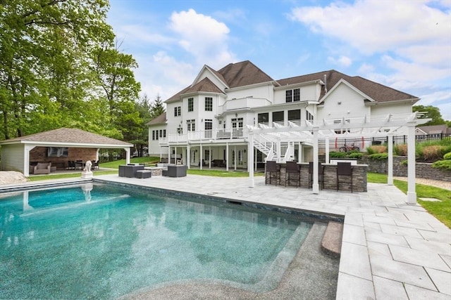3 Newton Ln, Medway, MA 02053 - back of house featuring outdoor lounge area, a pergola, a patio, an outdoor pool, and a shingled roof